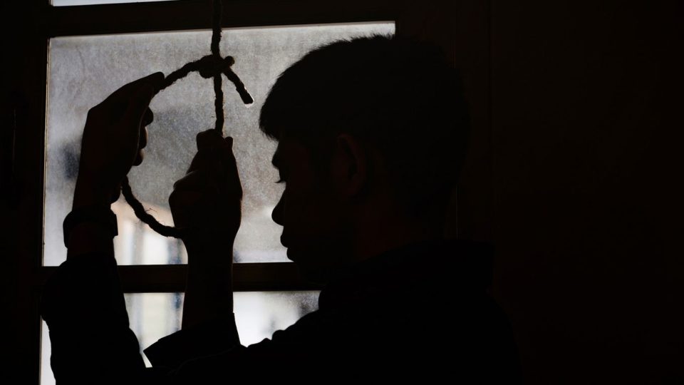 File photo of a man’s silhouette and a rope by the window. Photo: Freedom Studio
