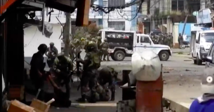 Scene on the ground on Aug. 24, as PH army secures the bomb site of twin explosions in Jolo, Sulu <i>Screengrab via VOA News / YouTube</i>