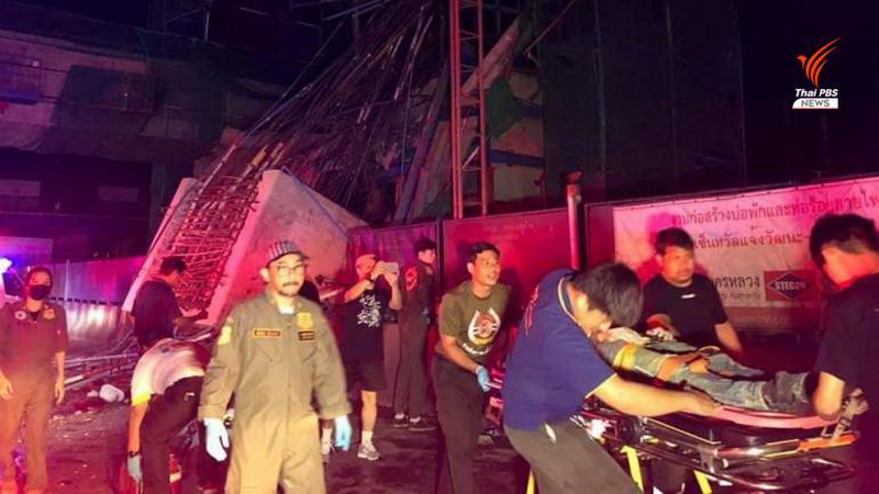 An injured worker is taken away from the scene of a construction accident that injured five early this morning in Bangkok’s Chaeng Wattana area. Photo: Thai PBS