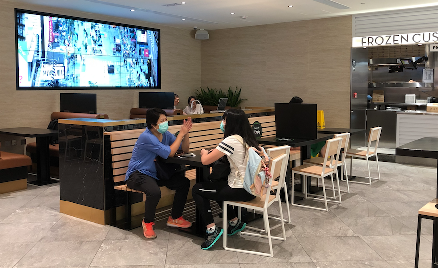 Customers wait for their food at Shake Shack in New Town Plaza, Sha Tin, on Aug. 23, 2020.
