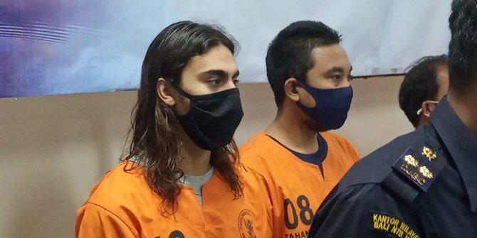 The suspect, left, identified by his initials JOPDV, is a college student from Puerto Rico. Photo: Istimewa via Merdeka