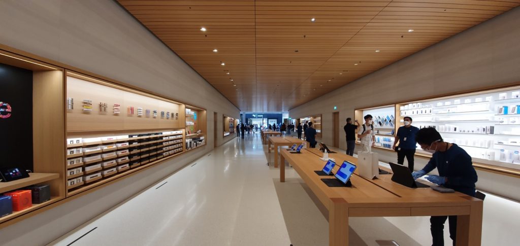 The narrow, elongated hallway of the store's basement level. Photo: Coconuts Singapore