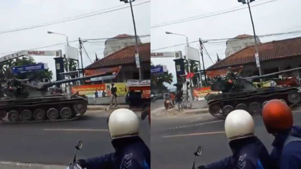 A tank belonging to an Indonesian Army unit in West Bandung regency, West Java appeared to lose control and accelerated before crashing into a gorengan cart and several motorcycles parked on the roadside. Screenshot from the video
