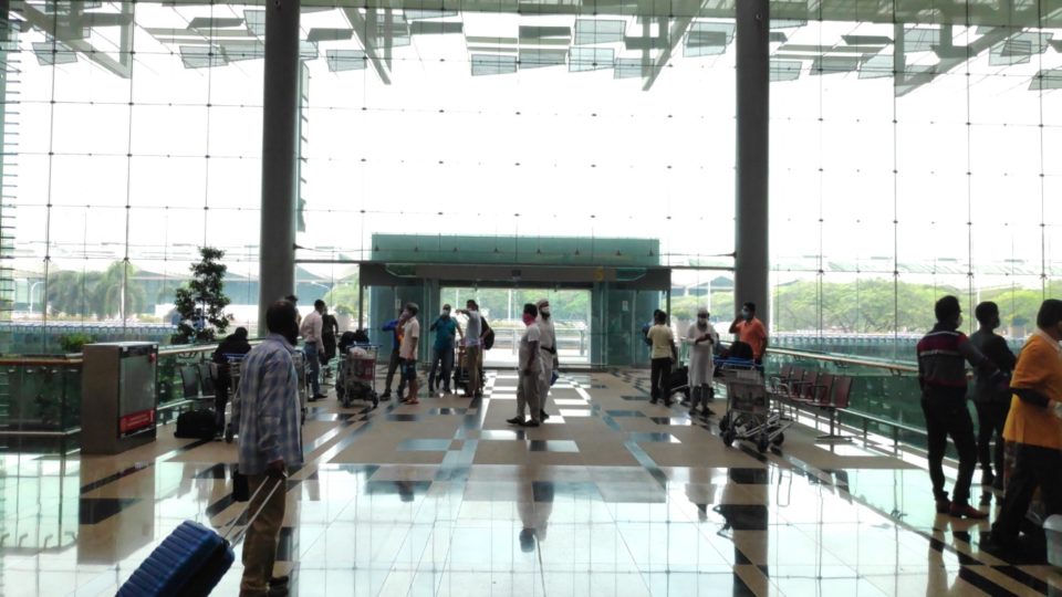 Travelers move through Singapore’s Changi Airport Terminal 3 on Aug. 25, 2020. Photo: Natasha Zaman