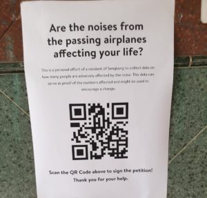 A note in Sengkang urges residents to sign a petition complaining about the noise. Photo: @Mediumshawn/Twitter