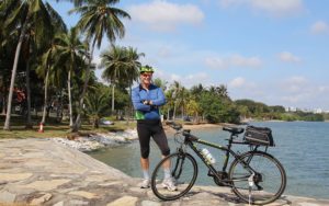 Tour leader Colin poses with his bicycle. Image: The Cycle Startup