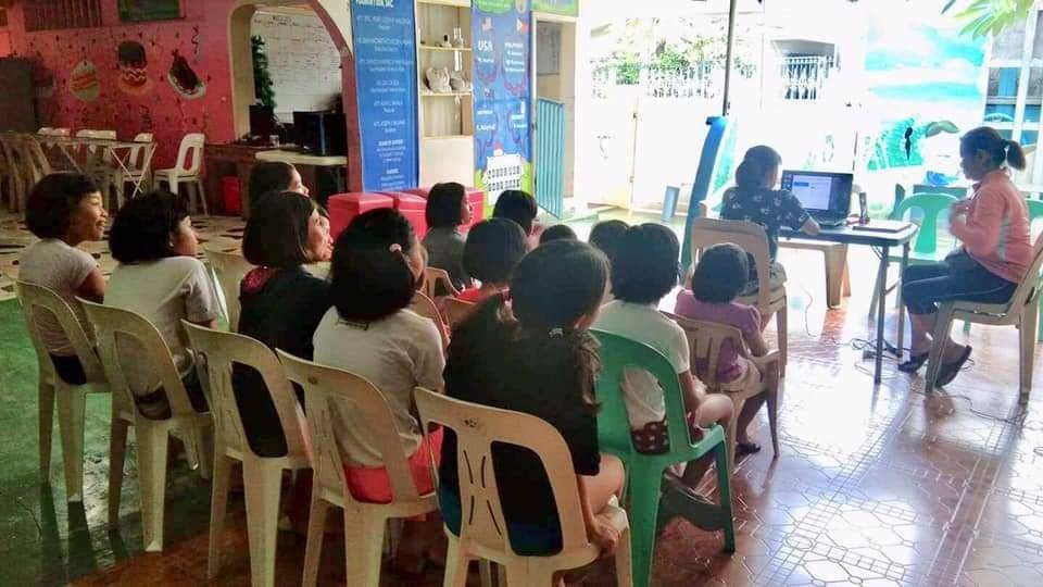 The children learn their lessons online inside the shelter. Photo: Meritxell