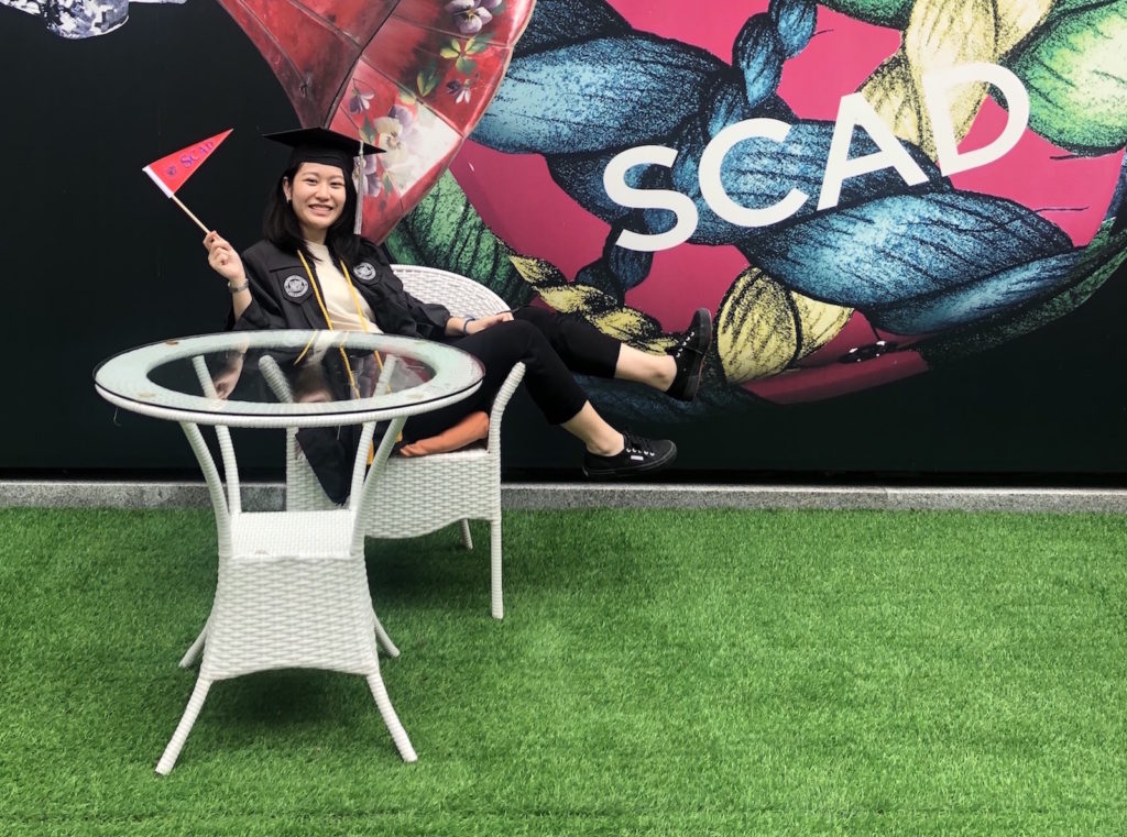 Ruby Chung poses for a graduation picture at SCAD in March. Photo provided by Chung