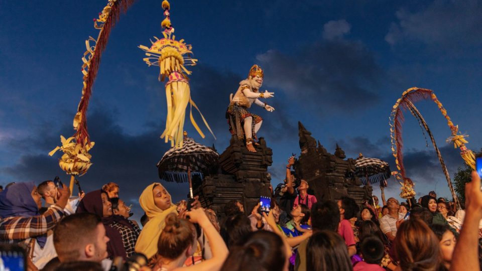 Tourists watching a performance in Bali, pre-pandemic. Photo: Unsplash
