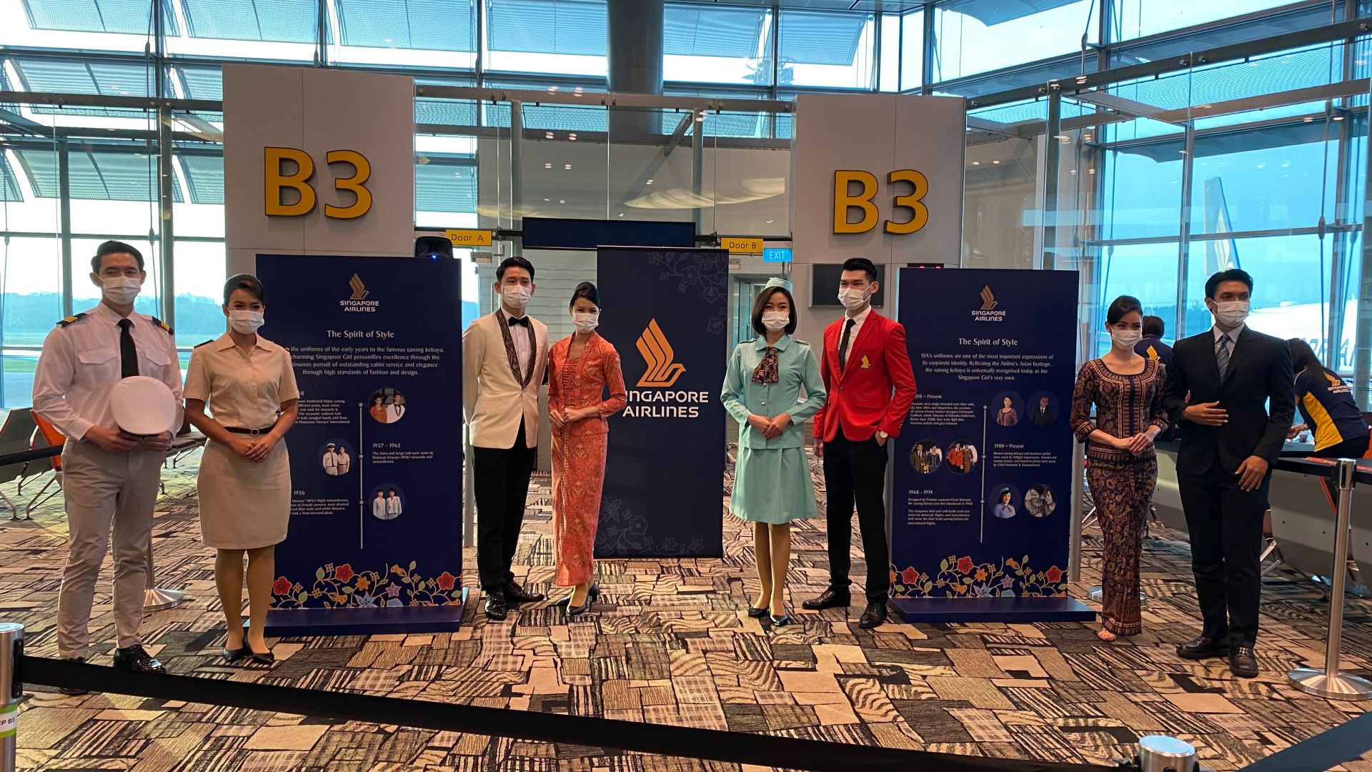 The crew dressed in the airline’s traditional costumes. Photo: Coconuts