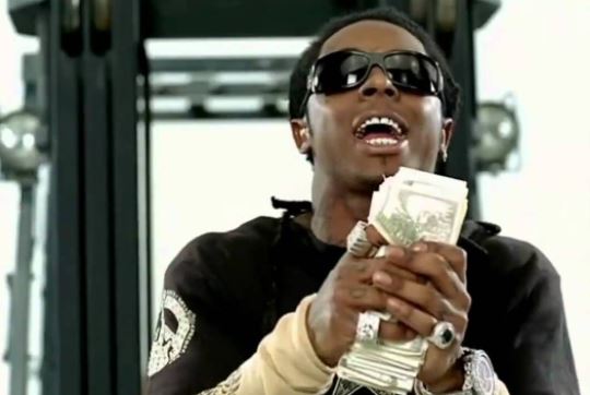 Screenshot from “Make It Rain” music video