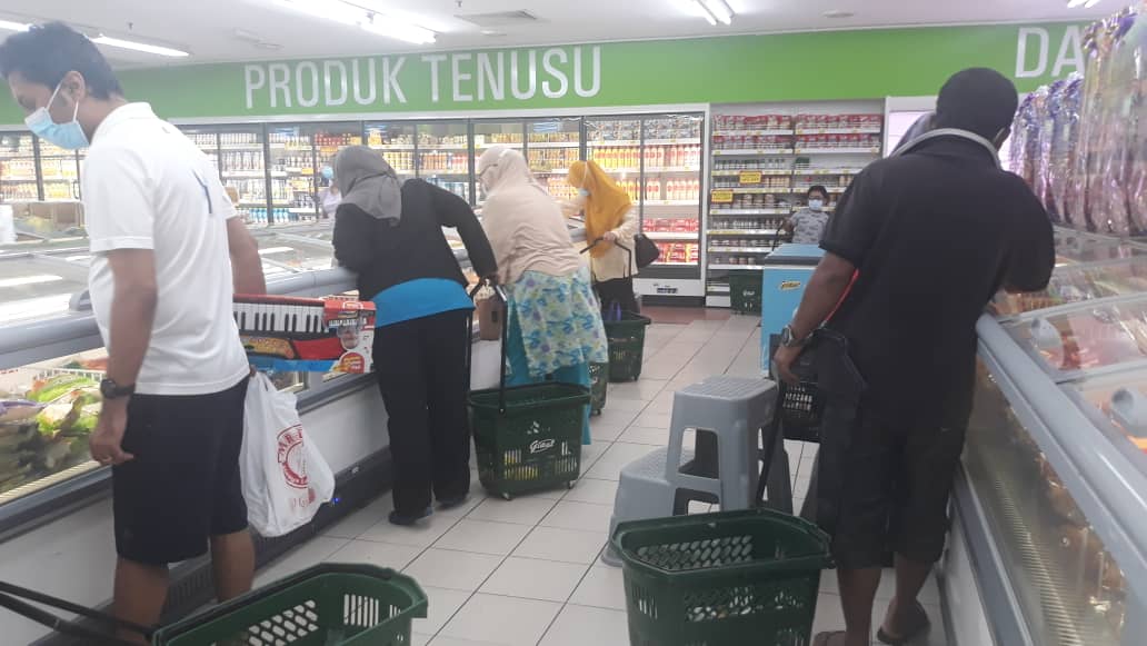 Shoppers at the frozen food section at the Giant supermarket in Ampang. Photo: Coconuts