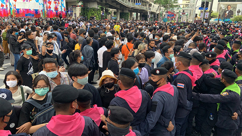 As of 5pm, police had fully encircled protesters in the street. Some are now brandishing helmets and shields and preventing anyone from leaving.