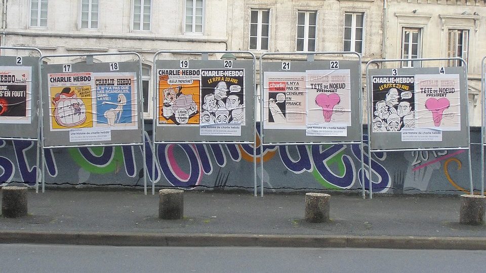 Charlie Hebdo magazine covers line a street in France. Photo: LCharrault