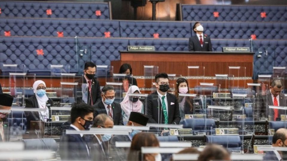 Parliament representatives standing at the House of Parliament today. Photo: Parlimen Malaysia/Facebook
