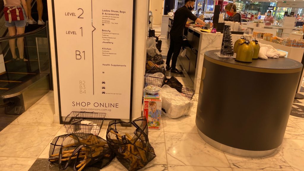 The clutter behind the cashier counter at The Heeren outlet. Photo: Coconuts