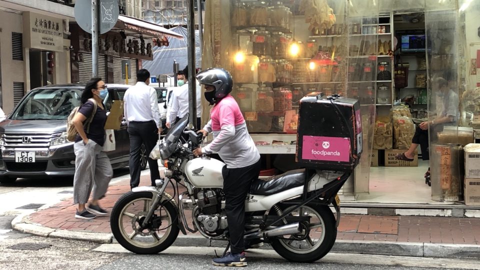 A Foodpanda driver delivers a food order in Sheung Wan. Photo: Coconuts Media