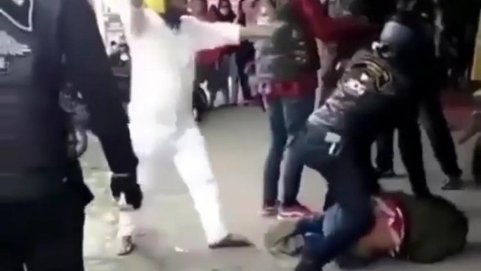 Harley riders assaulting military personnel in Bukittinggi, West Java on Oct. 30, 2020. Photo: Video screengrab