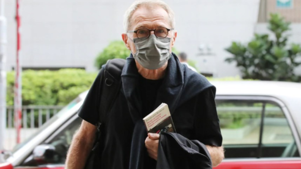 Marc Progin, a 75-year-old retiree who has been photographing the city’s social movements since 2012, has been cleared of the charge. Photo via Apple Daily
