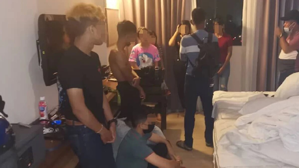 Some of the individuals in the hotel room this morning. Photo: Royal Malaysia Police Force