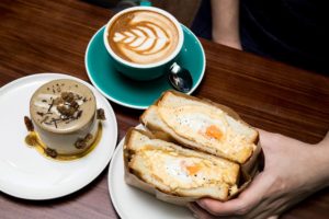 The cafe’s latte, Hojicha cake, and egg sandwich. Photo: Daniel Food Diary