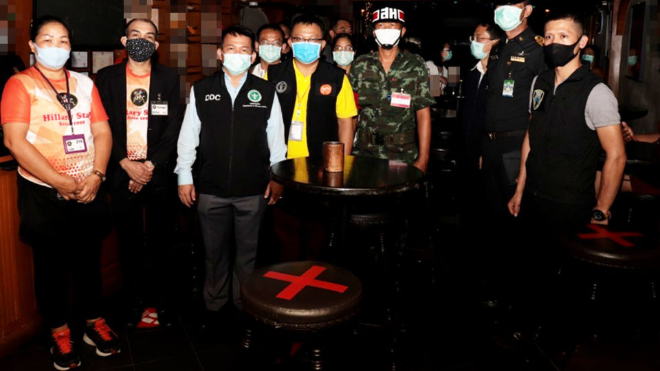 A file photo of health officials inspecting a Bangkok bar. Photo: Department of Disease Control / Facebook
