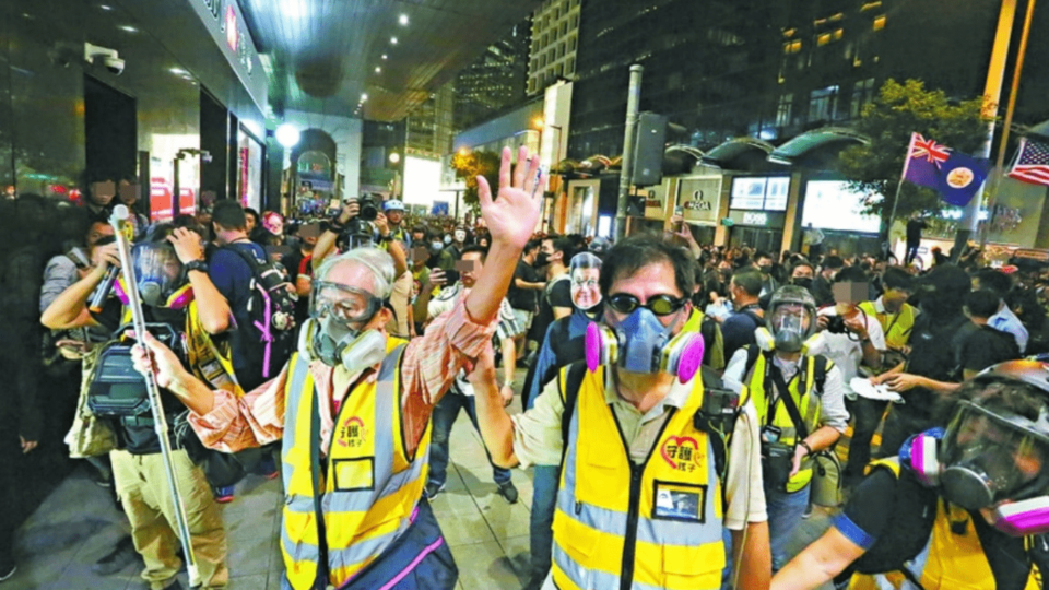 The church’s “Protect the Kids” group was a regular presence on the frontlines of last year’s protests. Photo via Apple Daily