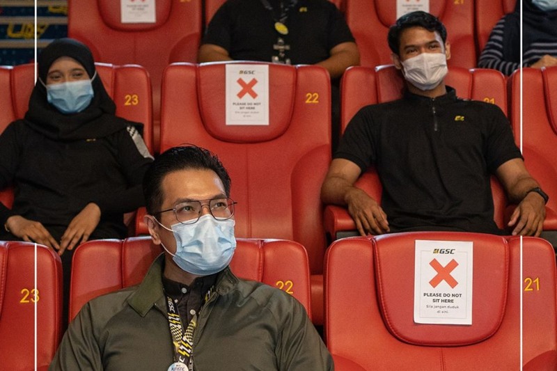 Cinemagoers watching a movie with their face masks on. Photo: GSC Cinemas/Facebook