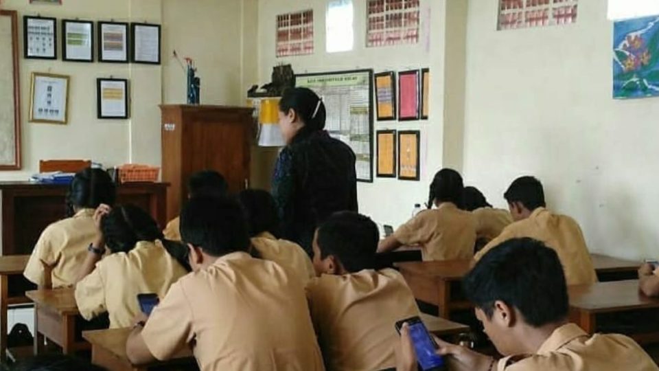 File photo taken in 2019 of students learning in a classroom. Photo: Denpasar’s Education, Youth and Sports Agency