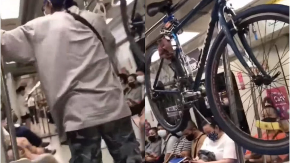 An unidentified man who boarded a train Tuesday night with his verboten bicycle. Photos: All Singapore Stuff/Facebook
