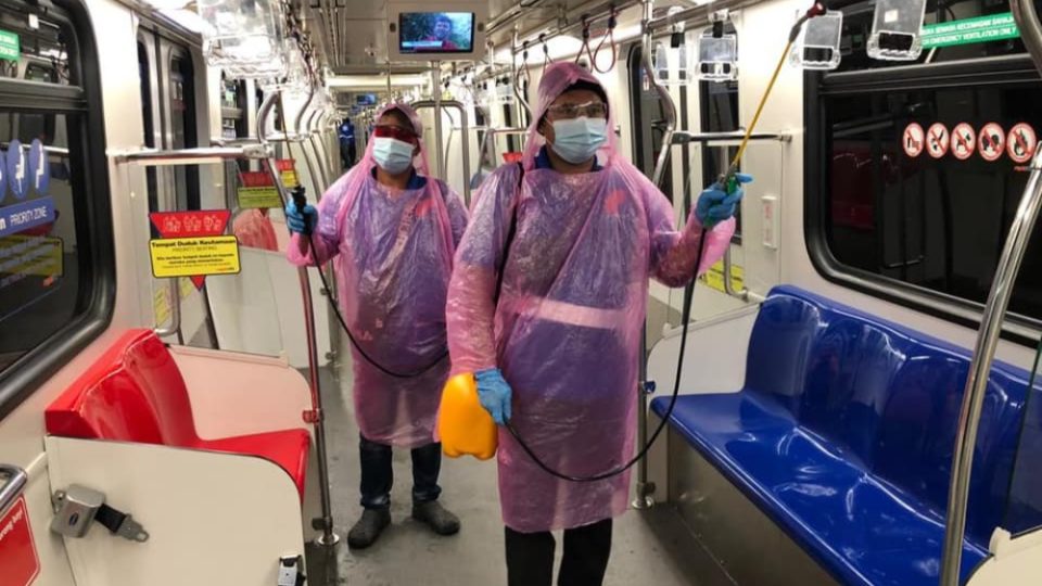 Rapid KL staff disinfect a train in an October photo. Photo: Rapid KL/Facebook
