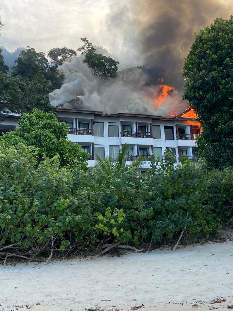 Fire razing the Andaman Resort building. Photo: Megtgmez/Twitter