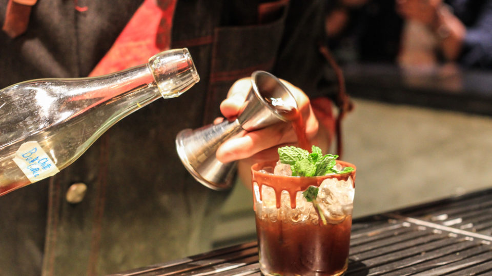 A bartender at Find the Locker Room preps ‘We Are Mint To Be,’ a cold-brew coffee with yellow pepper and mint. Photo: Coconuts Bangkok
