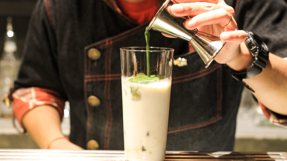 A bartender at Find the Locker Room preps We Are A Perfect Matcha (matcha, milk, hazelnut and strawberry whipped cream.) Photo: Coconuts