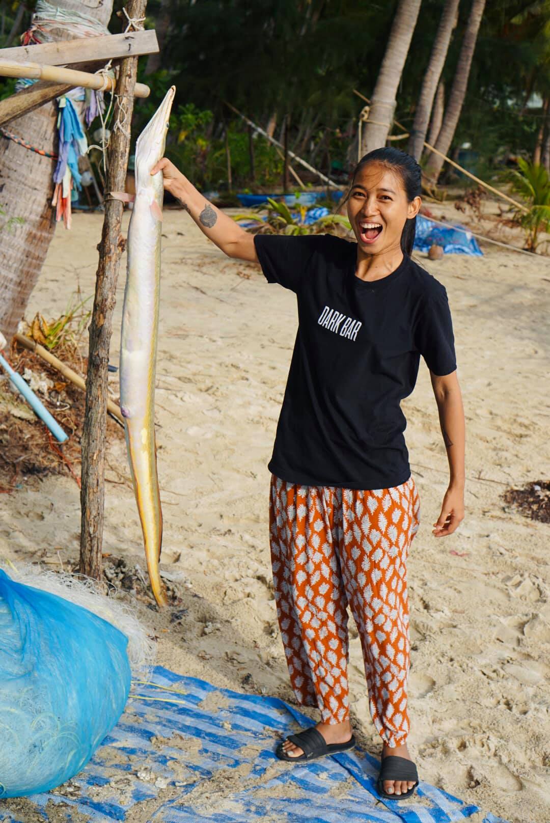 Mendy Indigo poses with a freshly-caught yellow pike conger. Photo: Mendy Indigo