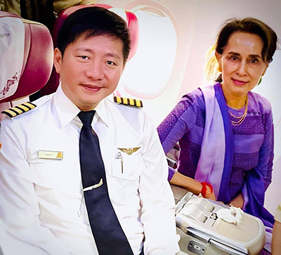 Myanmar National Airlines Chief Pilot Aung Po in an undated photo when he met Aung San Syu Kyi. 