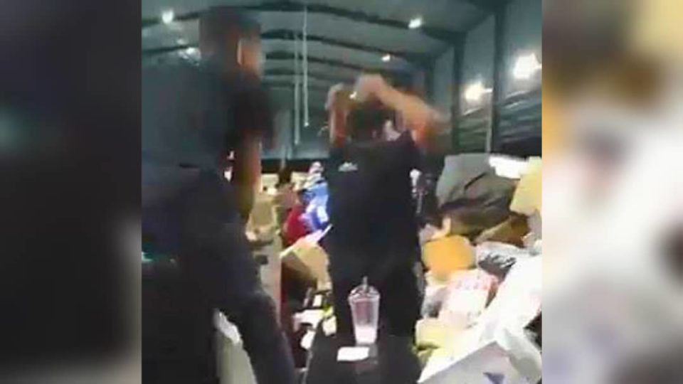 Video screengrab of J&T staff throwing a package. Photo: JamalTheRebel/Twitter
