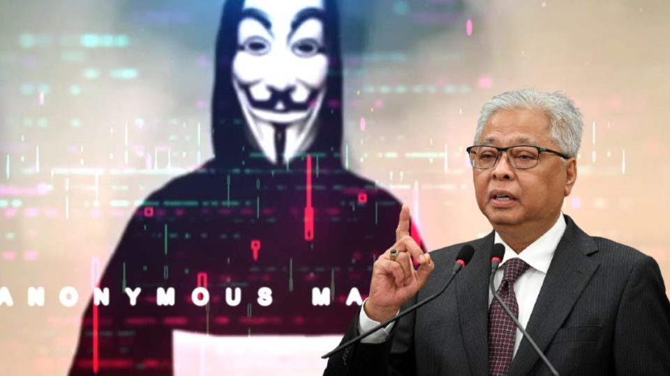 Edited photo of the Defence Minister, Ismail Sabri Yaakob against a screenshot of a video by Anonymous Malaysia. Photo: Coconuts