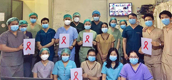 Personnel at Yangon General Hospital today participate in a a show of defiance.