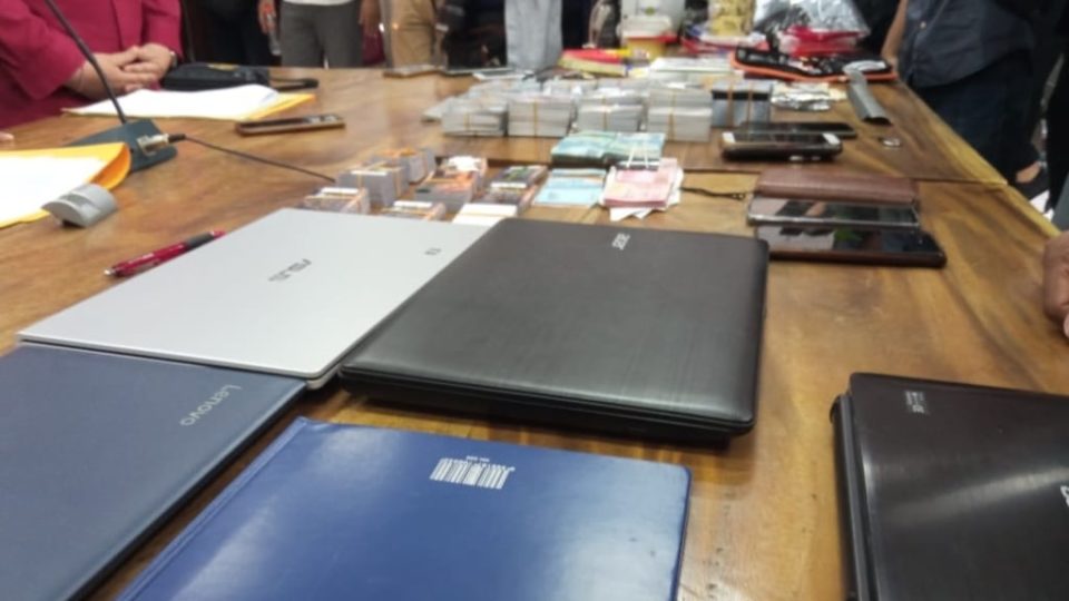 The Bali Police laid out some of the items seized during the arrests. Photo: Istimewa via Kumparan