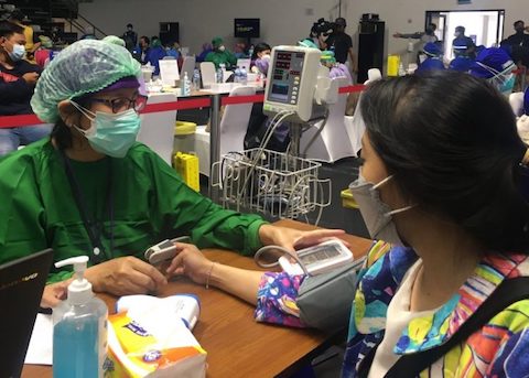 COVID-19 vaccine being administered in Indonesia. Photo: Health Ministry