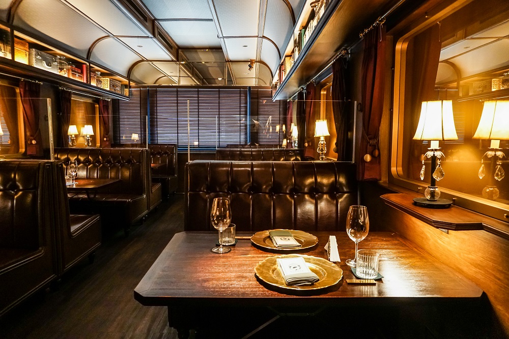 The second floor of Burapa, outfitted like the inside of a luxury Oriental Express train. Photo: Coconuts