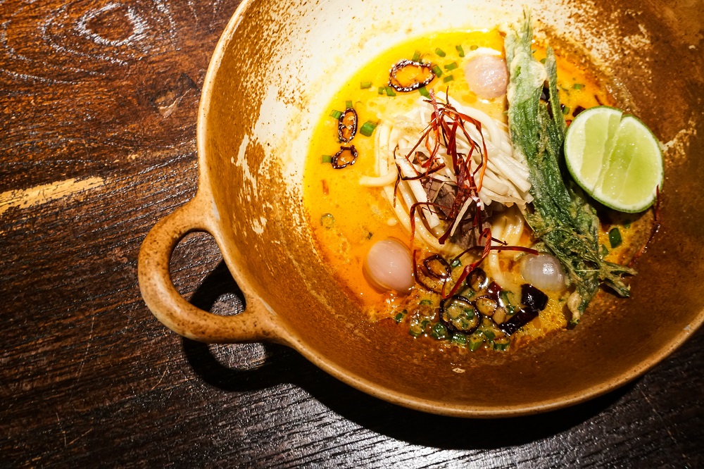 Egg noodle, stewed beef tongue in curry soup. Photo: Coconuts