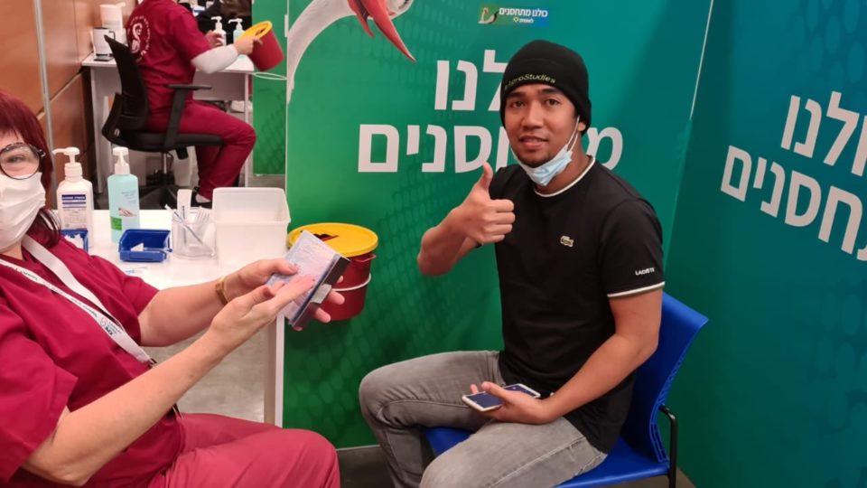 A Filipino receives his free COVID-19 vaccine in Israel. Photo: Israeli Embassy in Manila/FB