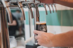 One of its dark beers being poured. Photo: Mikkeller Bar Singapore