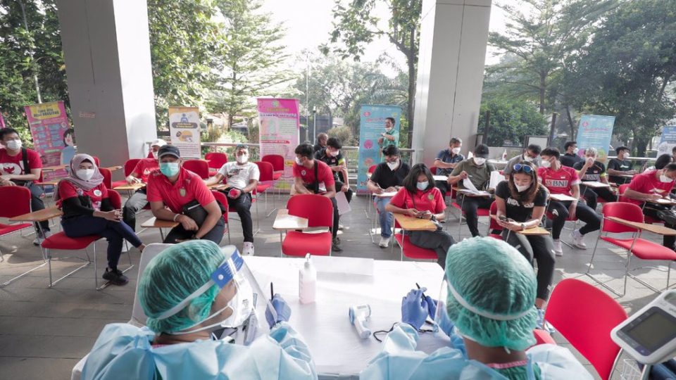 People waiting for their turn to get vaccinated in Indonesia. Photo: Ministry of Health