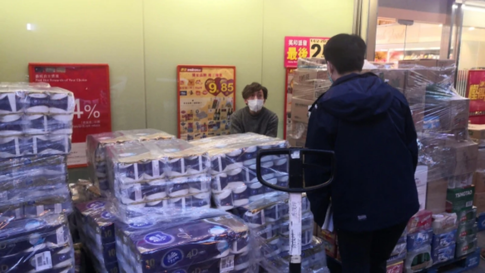 During the heist, a delivery worker unloading the toilet rolls outside the supermarket was held at knifepoint as the other men made off with the stolen goods. Photo via Apple Daily