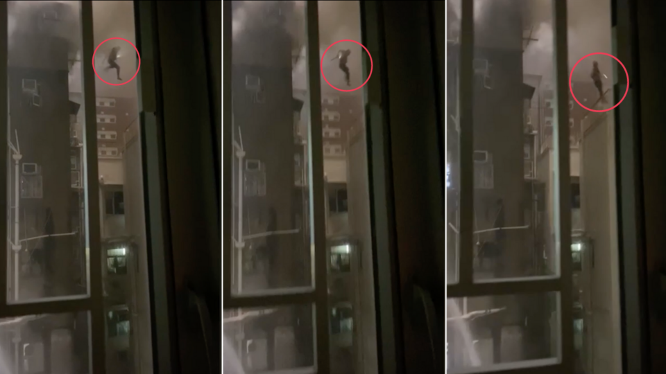 The man, who is of South Asian descent, appeared unscathed as he gathered with other building evacuees at a park downstairs in Hung Hom. Photo via Apple Daily