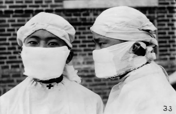Medical workers in China wearing Wu’s surgical mask in 1911. Photo: K. Chimin Wong/ Wikimedia Commons
