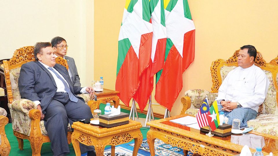 Zahairi Baharim, far left, meets with Aung Than Oo, far right. Photo: Myanmar Politics Watch/Facebook